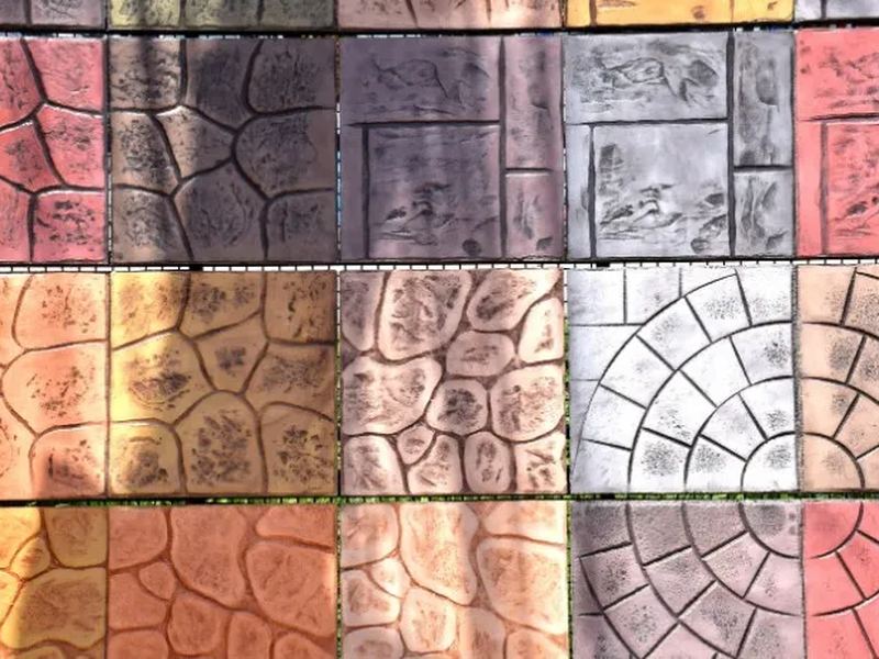 Muestrario de moldes de hormigón impreso en tonos terracota, gris, arena y rojo